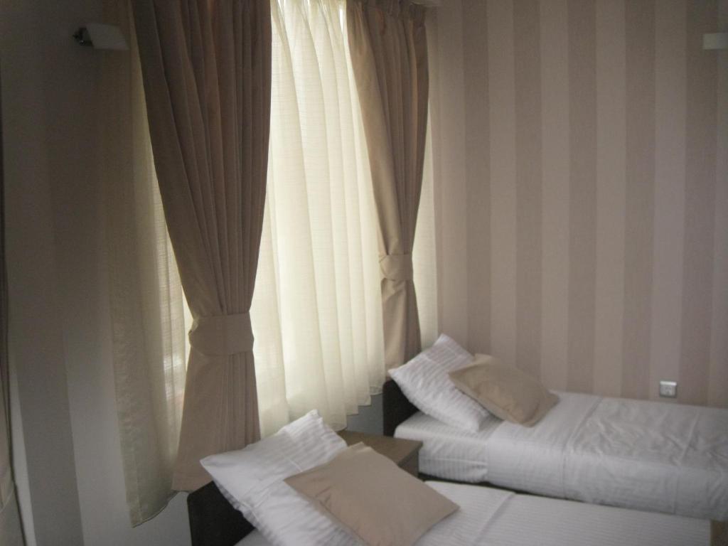 Domus Aparthotel Skopje Camera foto